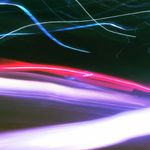 Abstract lines of neon light in motion